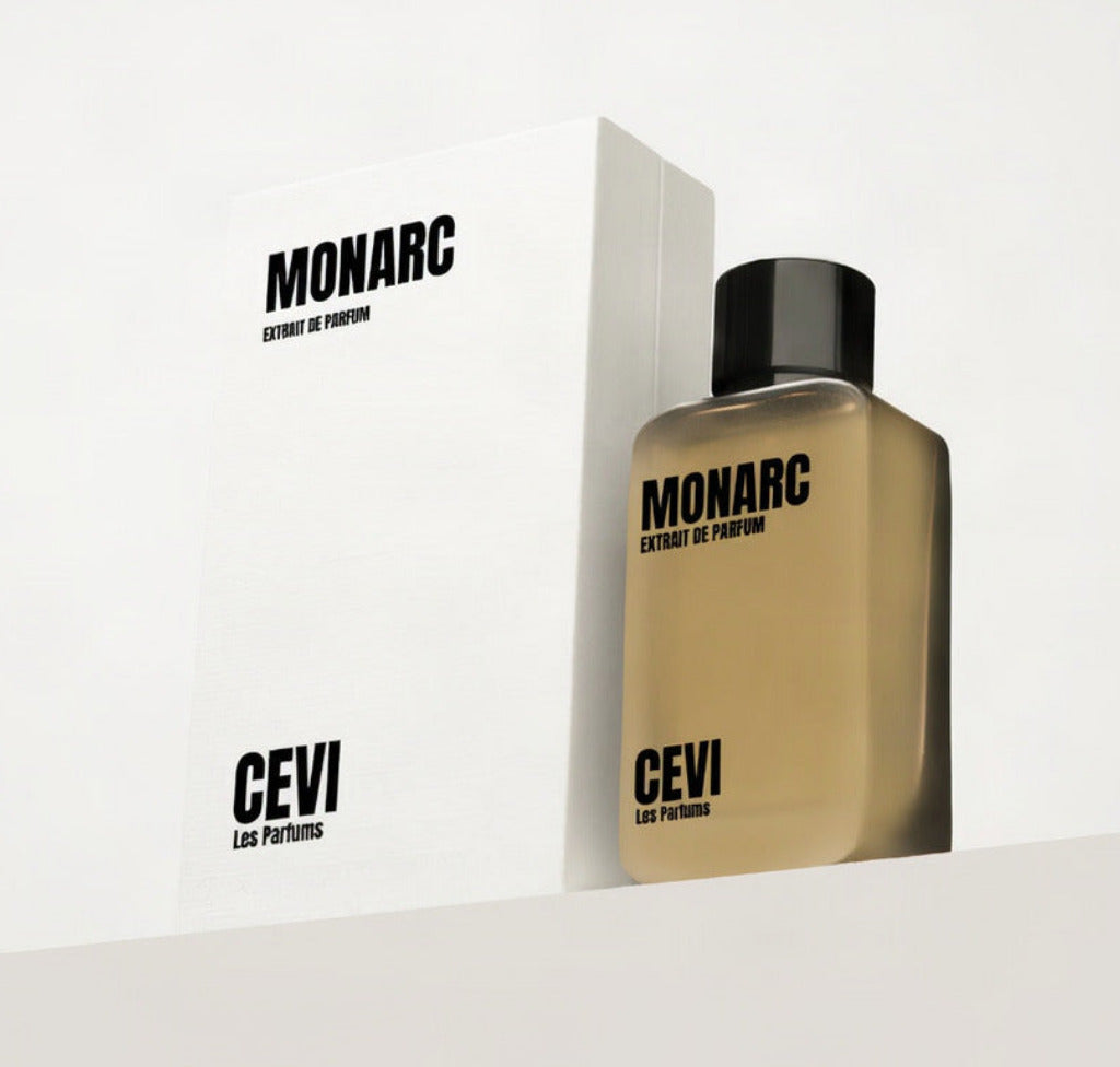 Monarc perfume bottle with packaging on a white background