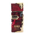 Red and gold perfume bottle with 'Le Bonheur' branding on a white background