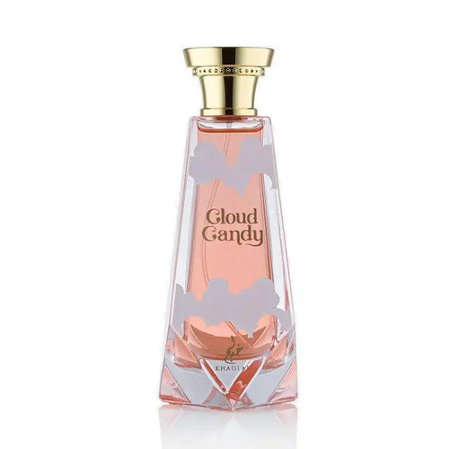 A transparent glass perfume bottle with gold cap and frosted cloud decals containing pink cloud candy by Khadim EDP 100ml