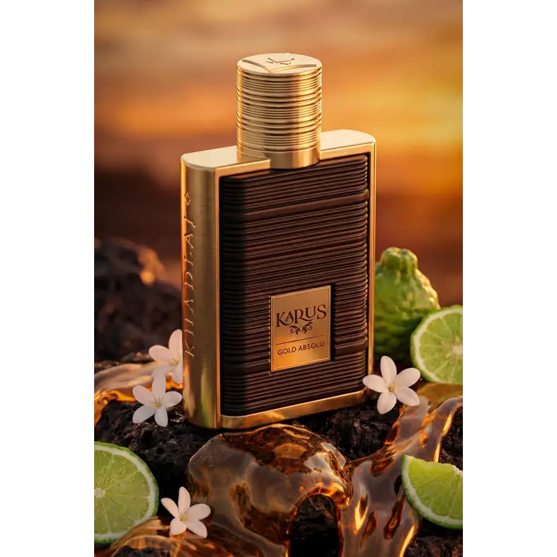 Gold-toned rectangular perfume bottle with textured dark brown body and ribbed gold cap labeled kapus gold absolu edp 100ml