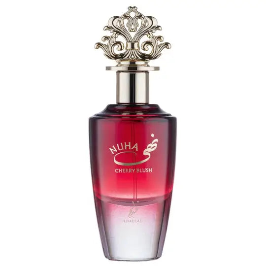 A sleek gradient red perfume bottle with a silver ornate cap labeled nuha cherry blush by eradial khadlaj edp 85ml