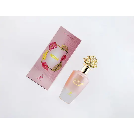 Nuha khadlaj edp 85ml pink gradient glass perfume bottle with gold ornate cap and tropical leaf pink packaging