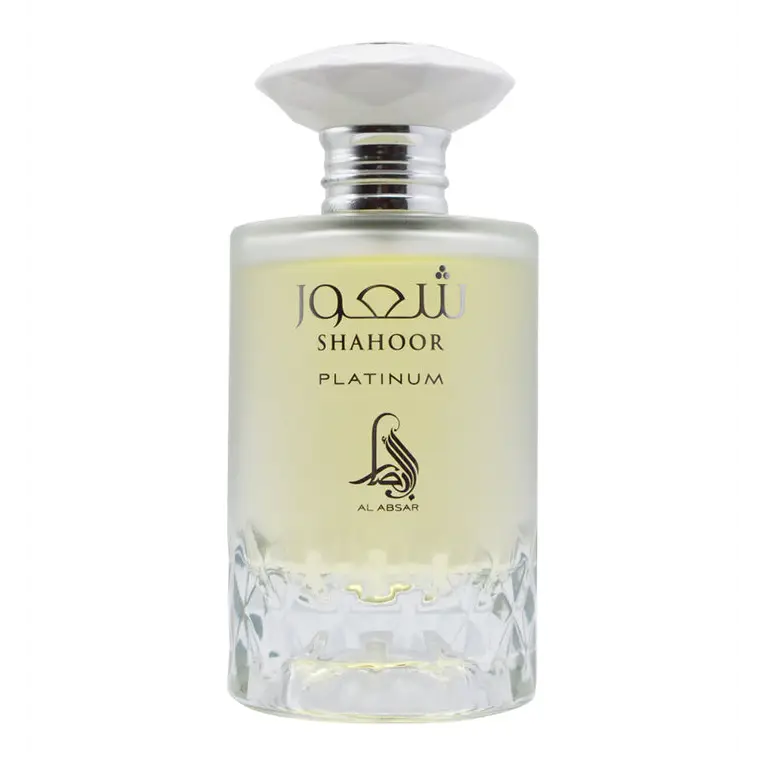 A clear glass bottle of Shahoor Platinum Al Absar EDP 100ml perfume with a white faceted cap and pale yellow liquid