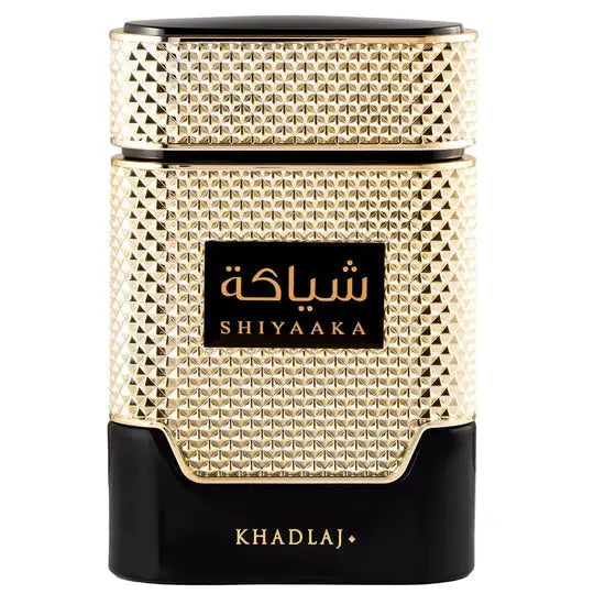 Gold-toned textured shiyaaka gold khadlaj edp 100ml perfume bottle with black cap and arabic script label