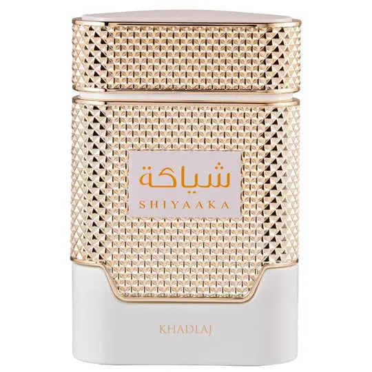 Gold-toned textured perfume bottle with geometric diamond pattern and white base shiyaaka rose gold khadlaj edp 100ml