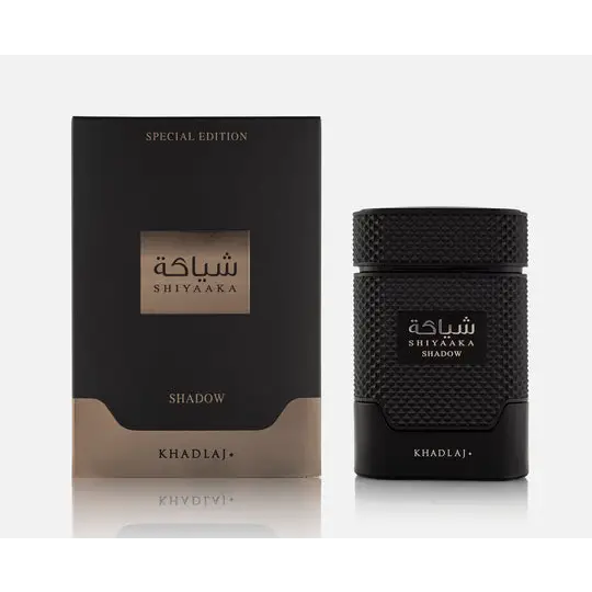 Black textured glass bottle of Shiyaaka Shadow Khadlaj EDP 100ml with matching black and gold packaging special edition
